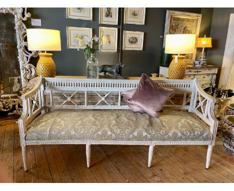 A 19TH CENTURY SWEDISH PAINTED WOOD SETTLEGustavian period,&nbsp; with distressed white paint, the back panel and arm rests c