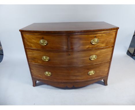 A Small Victorian Mahogany Bow Fronted Chest of Two Short and Two Long Drawers on Bracket Feet. 107x60x81cm High