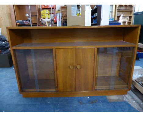 A Vintage Mahogany SIde Unit with Centre Cupboard Flanked by Two Shelved Glazed Displays and Open Shelf Over.