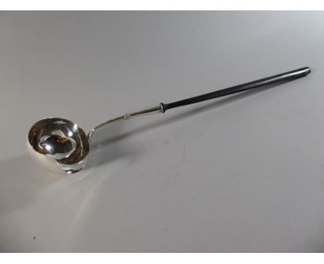 A Continental White Metal Ladle with Moulded Horn Handle. 42cms Long