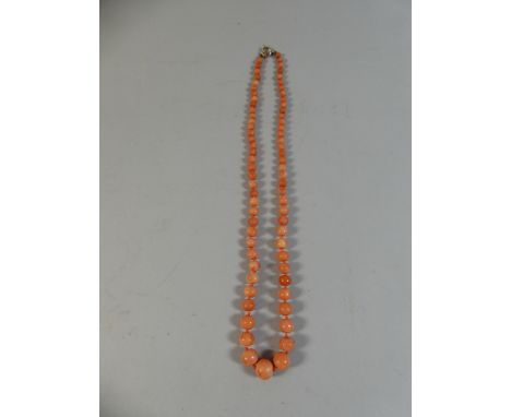 A Vintage String of Graduated Red Coral Beads