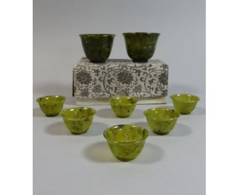 A Collection of Two Spinach Jade Tea Bowls and Six Smaller Nephrite Bowls. 6cm and 4cm Diameter. 