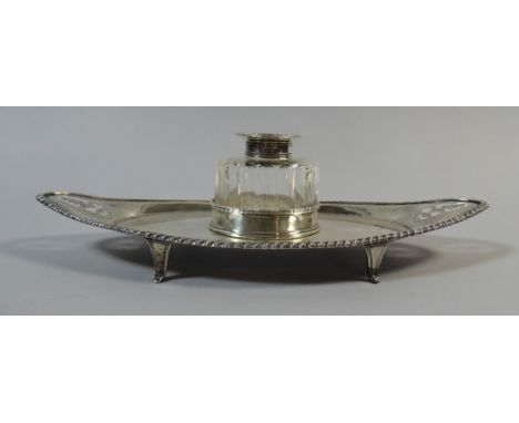 A Sheffield Silver Mounted Inkwell on Silver Boat Shaped Tray. 26cm Long