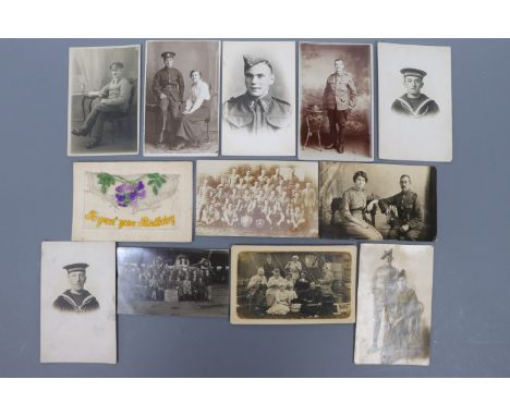 A quantity of largely Great War photographic portrait postcards including Royal Naval Division and other service personnel