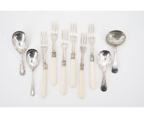 A set of six silver and Ivorine fruit forks together with four electroplate caddy spoons