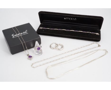 A group of contemporary silver, white metal and amethyst jewellery including a dress ring and pendant necklace, a bracelet et