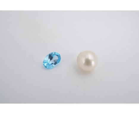 A pearl and blue gem stone, former 7 mm