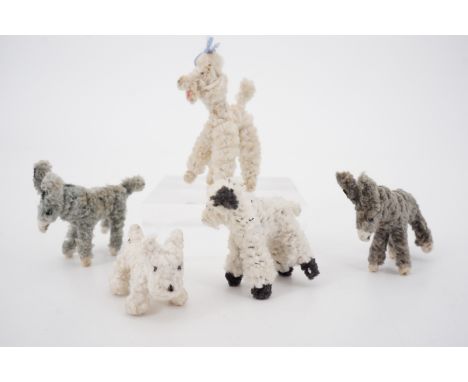 Vintage handmade pipe cleaner or chenille-stem animal novelties, including a Westie, a Poodle, a lamb and two donkeys