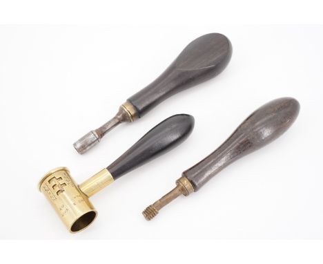 Three 19th Century gun tools comprising a powder measure, jag / reamer and nipple wrench