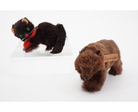 Two vintage animal fur novelties including a Norwegian brown bear bearing the town name of Stavanger, and a German cat playin