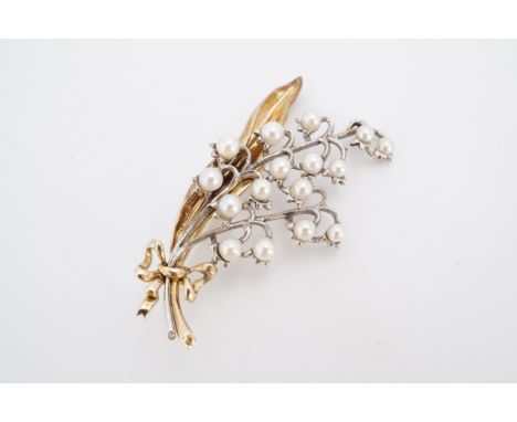 A fine late 19th / early 20th Century pearl-set yellow metal brooch in the form of a ribbon-bow-tied sprig of Lily of the Val