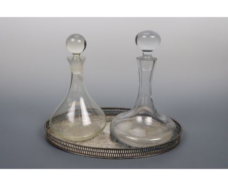 A Rodney / ship's decanter, one other decanter and an electroplate galleried tray