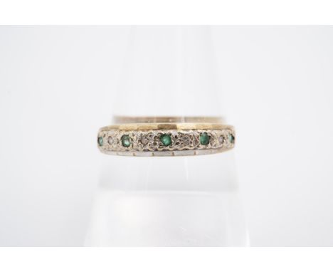 An emerald and diamond half hoop eternity ring, the small stones set on a 9 ct gold band, Q