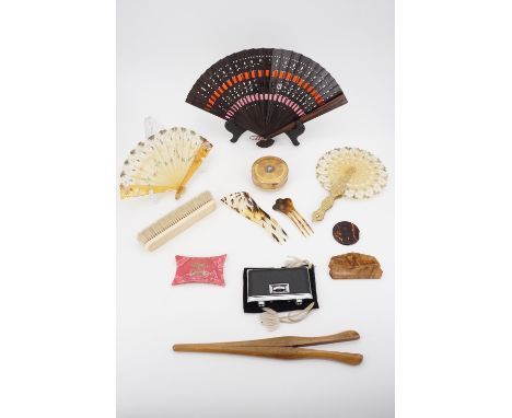 Collectors' items including three fans, glove stretchers, two hair slides, a comb etc.