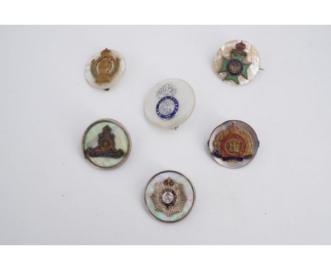Six mother-of-pearl sweetheart brooches