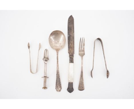 Two sets of silver sugar tongs, an enamelled electroplate pickle grab, a white metal spoon, a fork and a Victorian bread knif