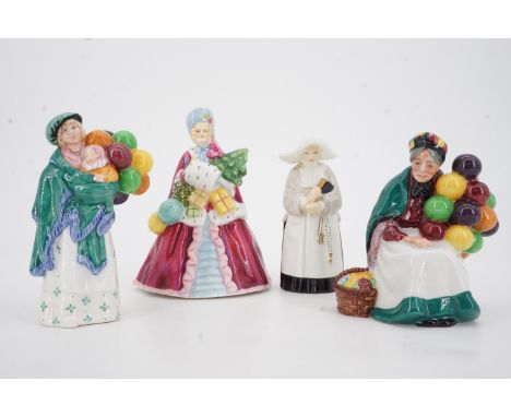 Two small Royal Doulton figurines; The Old Balloon Seller HN 2129 and The Balloon Seller HN 2130 together with a Royal Worces