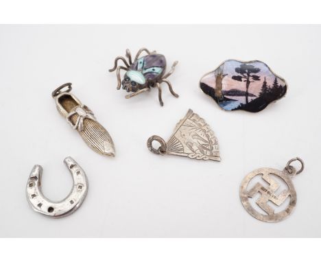 Vintage white-metal charms and novelties including a Charles Horner silver charm in the form of a lady's slipper, a Norwegian