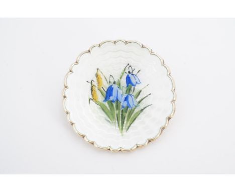 A Norwegian enamelled white metal brooch, of dished and scalloped form, basse taille enamelled over rose engine turning and e