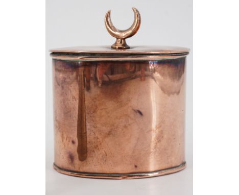 A late 19th Century copper caddy, having an oval section and hinged lid, the latter bearing a crescent-shaped knob, the base 