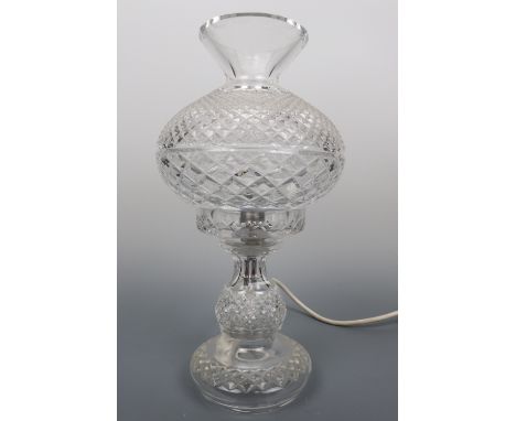 A cut glass table lamp, 36 cm high. Requires re-wiring.