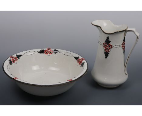 A Burleigh Ware wash jug and basin, the jug of slender form, decorated with a raised floral medallion suspended between whipl