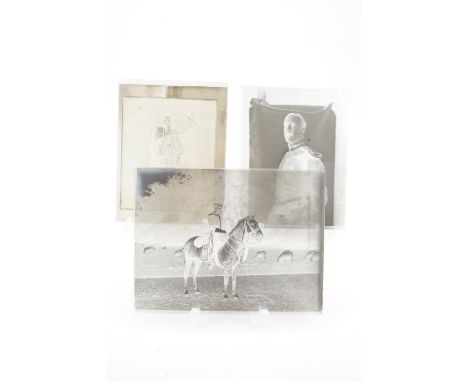 Seven late 19th Century full-plate glass photographic negatives depicting a British army Hussars officer and his mount, a hal