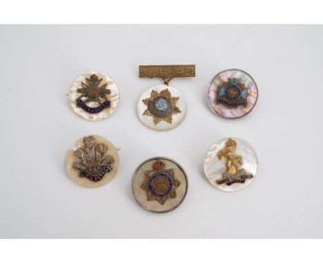 Six mother-of-pearl sweetheart brooches