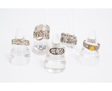 Seven Celtic-influenced silver / white metal finger rings