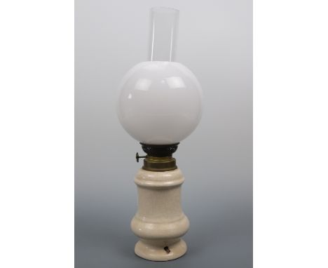 A modified oil lamp, 42 cm high
