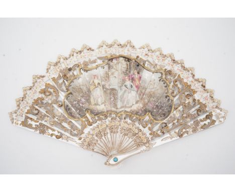 A vintage celluloid hand fan of imitation mother-of-pearl, hand decorated with an 18th Century romantic vignette, 18 cm