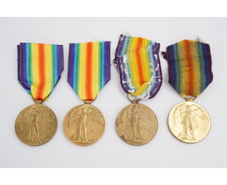 Four various Victory medals to 252131 Pte J Smith, Manchester R; 29402 Pte J Sholl, ASC, 136711 Dvr J Clarke, RE; 4598 Gnr C 