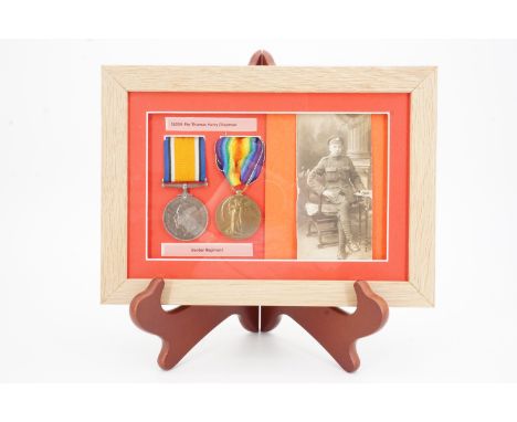 Framed British War and Victory medals to 51039 Pte Thomas Harry Chapman, Border Regiment, with portrait photograph