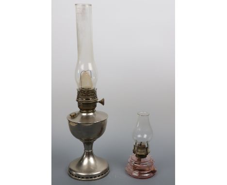 A 1930s Famos 120 CP oil lamp with chrome base, together with a pink glass finger lamp