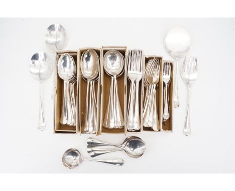 A 1930s suite of silver Hanoverian rat tail pattern cutlery comprising 6 table spoons, 12 dessert spoons, 6 soup spoons, 6 pu