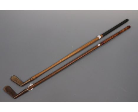 Two vintage golf putters
