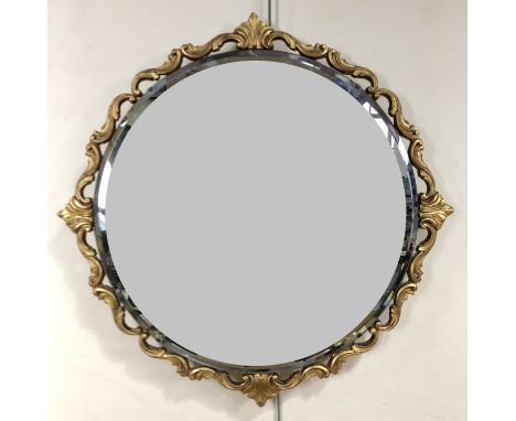 A gilt-framed circular wall mirror, 69 cm diameter
