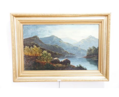 (19th Century) Large scale Lake District view at dawn, the sun-tinged mountains looming over inky waters, oil on board, unsig