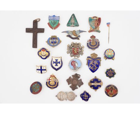 A large quantity of enamel lapel badges together with a Bakelite crucifix