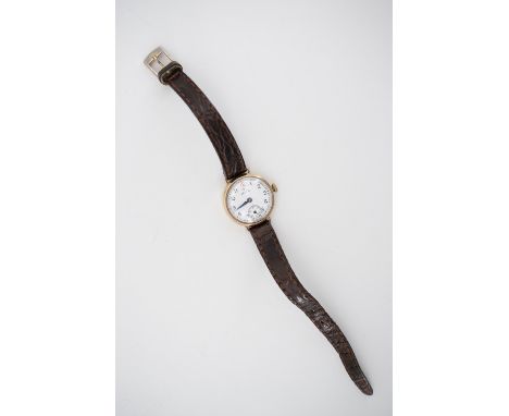 A 1950s lady's Record 9 ct gold wristlet watch, having a manual movement and circular white enamel face with Arabic numerals,