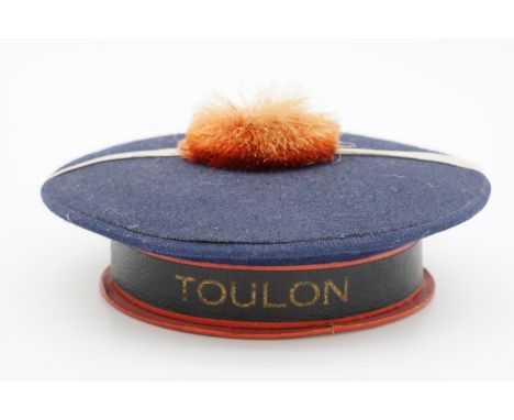 A vintage novelty cosmetics or confectionary box in the form of a French navy cap bearing a Toulon tally, 11 cm, circa 1930s 