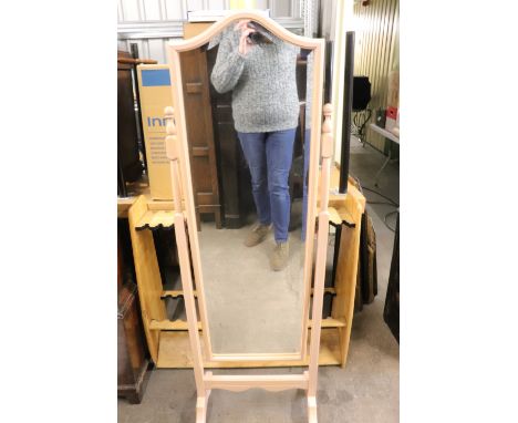 A contemporary cheval mirror