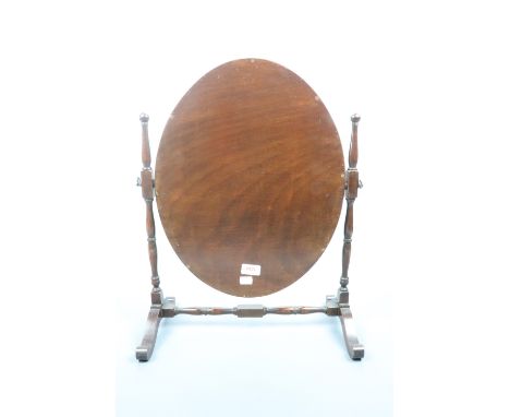 A mahogany oval toilet mirror, 56 cm high