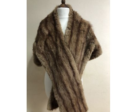 Two vintage fur stoles and a synthetic blue fur collar