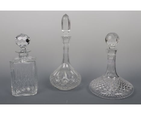 A Rodney ships decanter and two other decanters