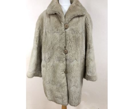 A D H Evans of Oxford vintage fur swing coat, with rolled collar and bracelet length sleeves, approximately 46 chest