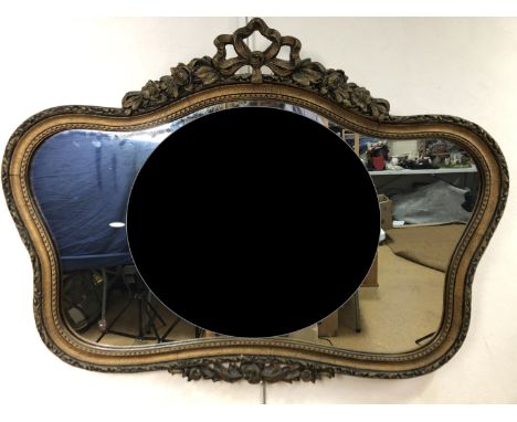 A large gilt-framed wall mirror, 96 x 71 cm