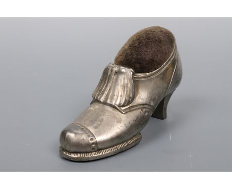 A vintage EPBM novelty pin cushion modelled as a lady's shoe
