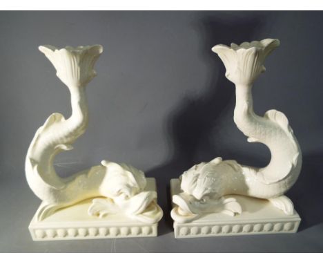 Wedgwood - a pair of Wedgwood candlesticks in the form of fishCondition One candlestick has a small chip / scratch to the gla