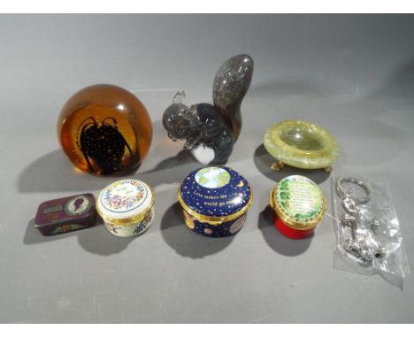 Three Halcyon Days enamel trinket boxes and a limited edition Selkirk glass paperweight Amber Queen numbered 127 of 500. This